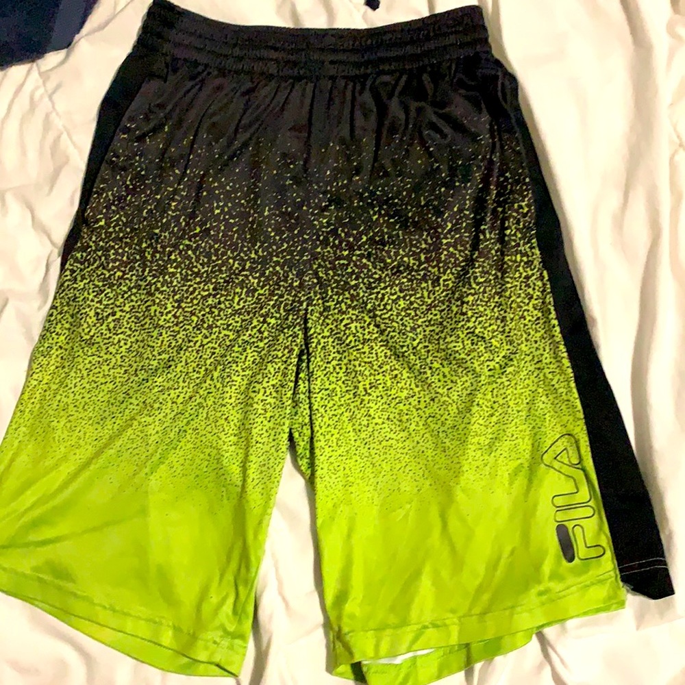Green and black fila shorts